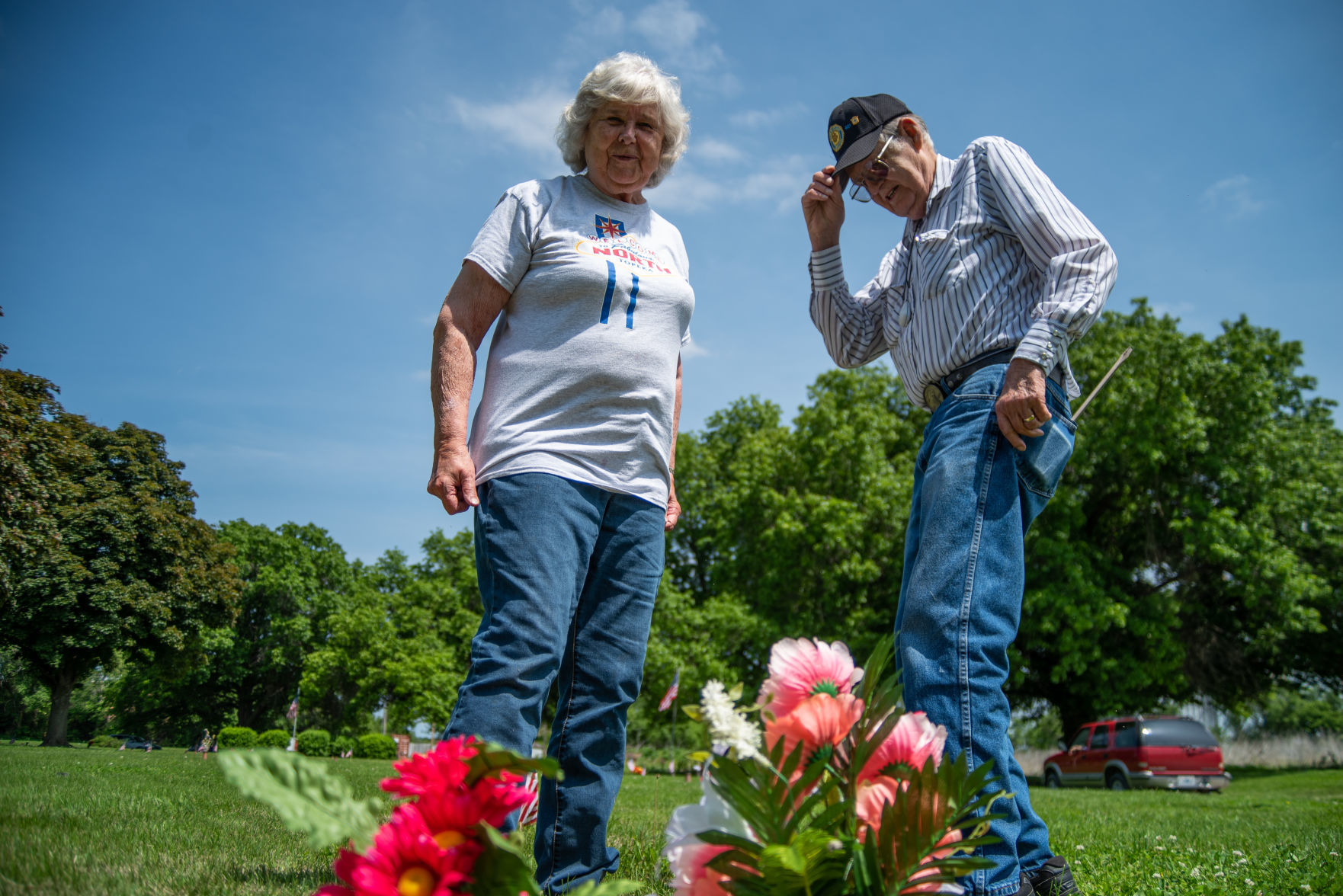 Bob and Rita Lewis place flowers at RitaÕs parents headstone at Valley View Memorial Park on Saturday. Bob and Rita drove from Topeka to visit William and Alice BlombergÕs headstone.